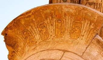 EGYPT, LUXOR - MARCH 01, 2019 ancient Egyptian hieroglyphs, drawings and inscriptions on the walls and columns in the temple of Karnak in Luxor photo