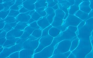 The reflection of the suns rays in the water in the pool with sea water, The glare of the sun, Egypt photo