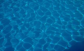 The reflection of the suns rays in the water in the pool with sea water, The glare of the sun, Egypt photo