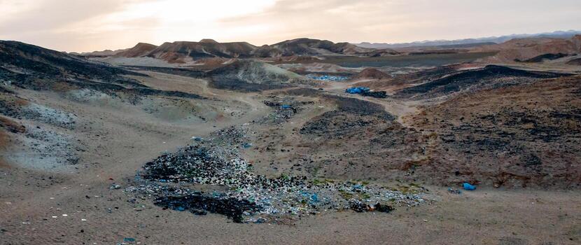 Plastic bottles and various garbage from hotels in the wild, Garbage dump in the desert in Egypt photo