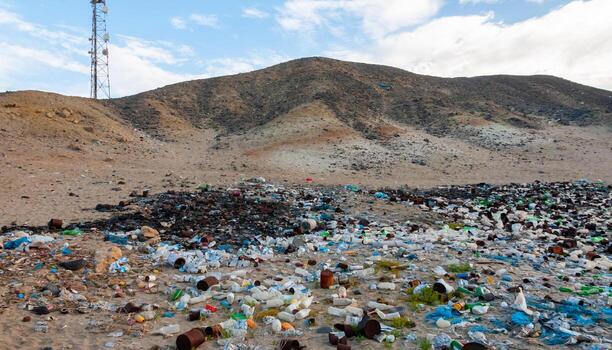Plastic bottles and various garbage from hotels in the wild, Garbage dump in the desert in Egypt photo