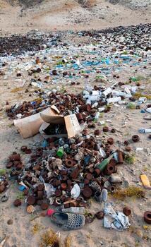 Plastic bottles and various garbage from hotels in the wild, Garbage dump in the desert in Egypt photo
