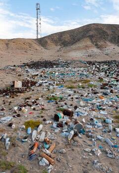 Plastic bottles and various garbage from hotels in the wild, Garbage dump in the desert in Egypt photo