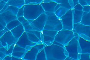 The reflection of the suns rays in the water in the pool with sea water, The glare of the sun, Egypt photo