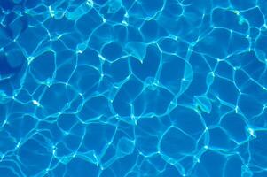 The reflection of the suns rays in the water in the pool with sea water, The glare of the sun, Egypt photo
