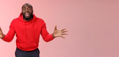 Please no not my games. Portrait shocked devastated panicking young bearded african american guy begging girlfriend not delete favorite app widen eyes yelling supplicating gesturing hands upset photo