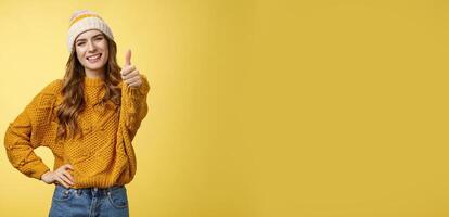 Lucky good-looking friendly supportive girlfriend congratulating you nice work good job show thumb-up gesture satisfied liking awesome product recommend promotion, smiling yellow background photo