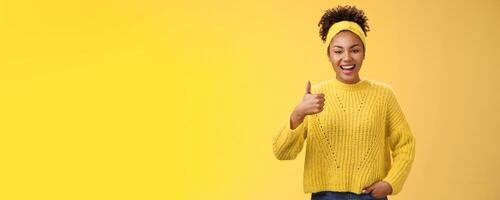 Energetic outgoing good-looking female office assistant ready help out show nice thumbs-up gesture check out awesome result great work done approval sign smiling accepting recommend service photo