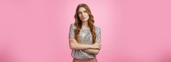 Cutiour thoughtful charming young caucasian female dress-up party night-out look up thinking dreaming, have idea consider were go, standing pleased upbeat ready have fun all night, pink background photo