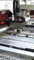 Modern automated solar energy production. Working factory mechanism of making solar cells. Innovation technology concept. Vertical video