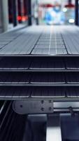 Working factory mechanism of making solar cells. Innovation technology concept. Vertical video