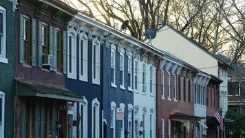 The beautiful little town landscape with the colorful autumn leaves and old buildings in USA photo