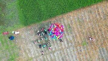 Aerial View of a Lively Baishakhi Festival in a Green Village Field video