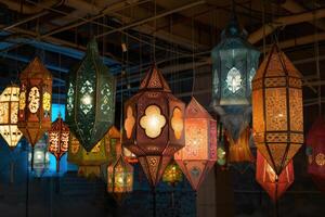 A Collection of Beautiful Ramadan Lanterns Hanging Brightly in the Night photo