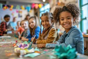 Children at table with paper crafts photo