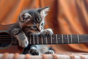 Playful Kitten Joyfully Interacting with a Guitar, Showcasing Adorable and Amusing Moments photo