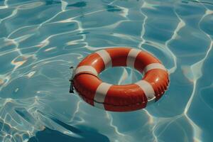 Floating Safety Ring in the Pool, Offering Lifesaving Protection and Essential Rescue Equipment for Swimmers photo