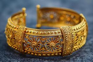 Luxurious Gold Bracelet with Intricate Designs and Rich Texture photo
