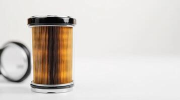 Clean oil filter displayed against a white backdrop, featuring a spa aesthetic. photo