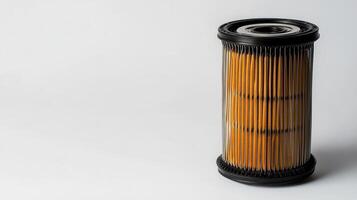 Clean oil filter displayed against a white backdrop, featuring a spa aesthetic. photo