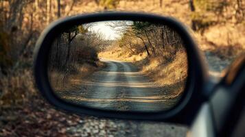 Reflection of the road scene in a mirror, showing the landscape. photo