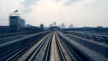 Moving Fast on Railroad Track with High Speed Train Railway Rushing Through the City Streets photo