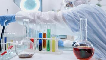 researcher pipetting samples in tube with chemist material in the pharmaceutical lab chemical engineer working in the research laboratory photo