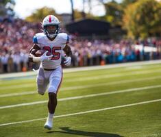 An American football player in a white uniform runs with the ball in his right hand during a match photo