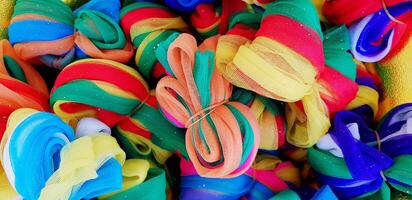 Many colorful fabric or cotton for background and decorated festival, party or event. Beautiful and Multi color concept. photo