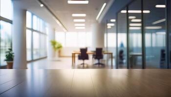 blurred open office space with large floor-to-ceiling windows, allowing plenty of natural light to flood the room. The soft focus creates a serene and modern ambiance, making it ideal for business photo
