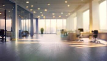 blurred open office space with large floor-to-ceiling windows, allowing plenty of natural light to flood the room. The soft focus creates a serene and modern ambiance, making it ideal for business photo