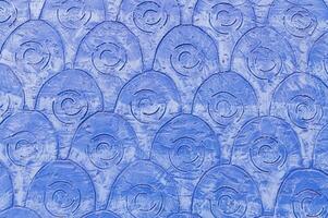 Background of blue plaster with a pattern photo