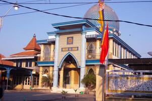 Gresik, Indonesia, August 20 2023 - landscape of the Muhammadiyah mosque building in Lebanisuko Gresik village, East Java. photo