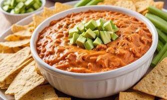 Creamy Avocado and Tomato Dip with Tortilla Chips photo