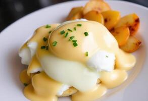 Gourmet Eggs Benedict with Grilled Peaches photo