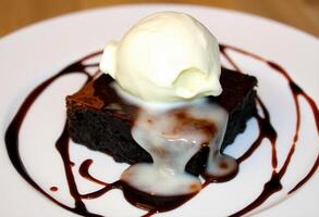 Decadent Chocolate Brownie with Vanilla Ice Cream photo