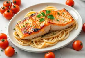 Grilled Salmon on a Bed of Spaghetti photo