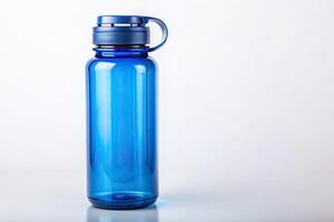 Blue reusable water bottle with secure lid on white background, blue, white background, secure lid, hydration, eye level, eco friendly photo