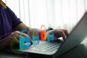 Men use computer identification to access data, and unlock digital padlock. photo