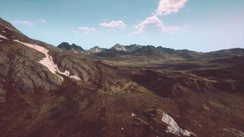 An aerial view of a mountain range with a sky background video