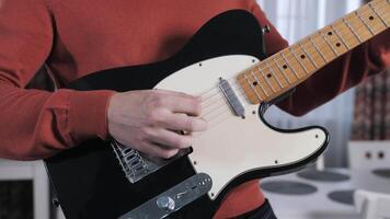 Playing the guitar. Close-up of the hands. Strings. video