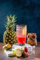 Pure organic Fruit Cocktail with Shaker and Ice Cubes photo