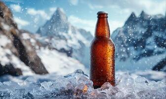 One brown beer bottle on ice, snowy mountains background with copy space photo