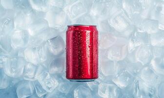 Blank red aluminum can, crushed ice background with copy space photo