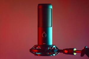 Studio condenser microphone isolated on dark background. photo