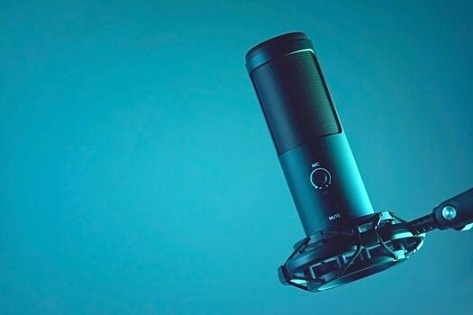 Studio condenser microphone isolated on dark background. photo