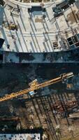 Process of building a stadium, aerial top view. Stock footage. Construction site, creation of metal structures during the construction of a stadium. video