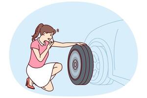 Woman looks at punctured car tire trying to call for help to change tire or haul automobile vector