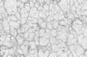 a black and white halftone pattern with a white background, vintage grunge dots texture, vector