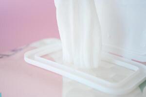 Cleansing wet wipes on table with copy space photo